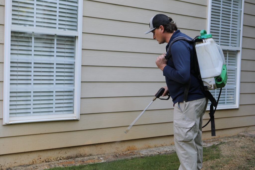 Technician providing professional pest control services for homes and businesses. Technician providing professional pest control services for homes and businesses.